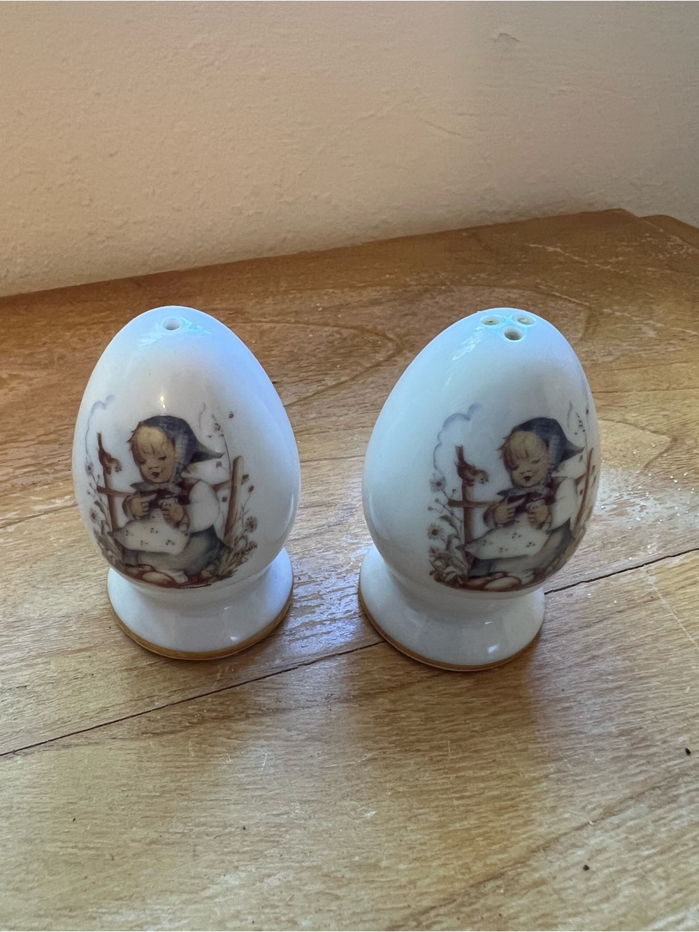 M.J. Hummel porcelain egg-shaped salt and pepper shakers